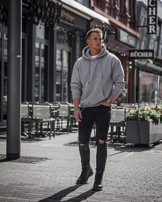 Black Leather Casual Boots Outfits For Men: For an off-duty look, consider pairing a grey hoodie with black ripped skinny jeans — these two pieces fit well together. Go the extra mile and shake up your outfit by finishing with black leather casual boots.
