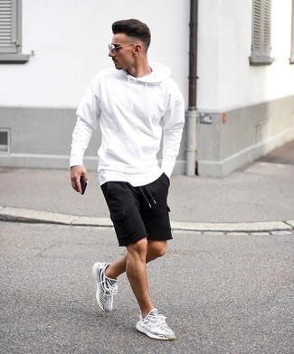 Silver Sunglasses Outfits For Men: Rock a white hoodie with silver sunglasses for an unexpectedly cool look. Hesitant about how to complete your outfit? Rock white and black athletic shoes to dial it up a notch.