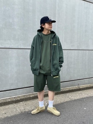 Dark Green Shorts Outfits For Men: This dapper ensemble is so simple: a dark green hoodie and dark green shorts. Finishing with beige suede desert boots is the simplest way to bring some extra depth to this look.