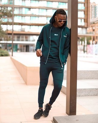 Dark Green Sweatpants Outfits For Men: For an on-trend look without the need to sacrifice on comfort, we turn to this combination of a dark green hoodie and dark green sweatpants. All you need now is a good pair of black athletic shoes.