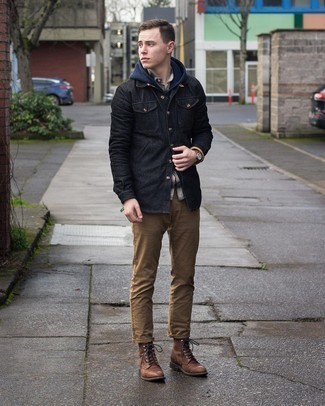 Black Denim Shirt Outfits For Men: You'll be amazed at how easy it is for any gent to get dressed like this. Just a black denim shirt and brown chinos. And if you wish to immediately amp up your outfit with one item, why not complete this ensemble with a pair of brown leather casual boots?