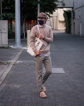 Tan Hoodie Outfits For Men: This laid-back combination of a tan hoodie and khaki chinos comes to rescue when you need to look casually dapper in a flash. And if you need to easily tone down this outfit with footwear, complement your getup with tan leather sandals.