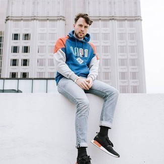 Blue Hoodie Outfits For Men: Swing into something laid-back yet on-trend in a blue hoodie and grey jeans. If you wish to instantly dial down your look with footwear, complete your ensemble with black and white athletic shoes.