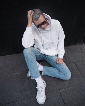 White Hoodie Outfits For Men: Marrying a white hoodie with light blue jeans is an amazing pick for a relaxed but on-trend outfit. White athletic shoes will bring a more casual finish to an otherwise mostly dressed-up outfit.