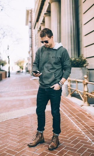 Olive Hoodie Outfits For Men: This relaxed casual combo of an olive hoodie and navy jeans is super easy to throw together in no time, helping you look awesome and ready for anything without spending a ton of time combing through your wardrobe. With shoes, go for something on the dressier end of the spectrum with a pair of brown leather casual boots.