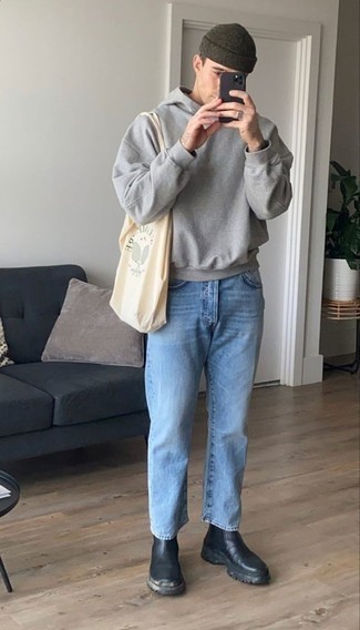 Beige Print Canvas Tote Bag Outfits For Men: The pairing of a grey hoodie and a beige print canvas tote bag makes for a solid relaxed outfit. And if you wish to easily spruce up this look with one single piece, introduce a pair of black leather chelsea boots to the equation.