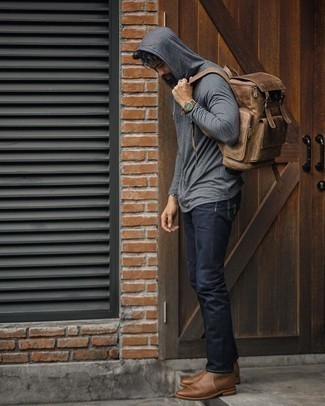 1200+ Fall Outfits For Men After 40: Make a charcoal hoodie and navy jeans your outfit choice to achieve an interesting and current casual outfit. Complete this ensemble with brown leather chelsea boots to immediately boost the classy factor of any ensemble. This outfit is a viable choice if you're piecing together a well-coordinated outfit for unpredictable fall weather. As a mature man, you're sure to appreciate this ensemble.