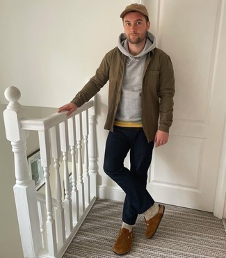 Brown Long Sleeve Shirt Outfits For Men: Effortlessly blurring the line between dapper and relaxed, this pairing of a brown long sleeve shirt and navy jeans can easily become one of your go-tos. Add brown suede loafers to the mix to change things up a bit.