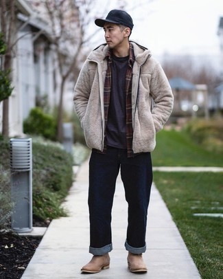 Beige Fleece Hoodie Outfits For Men: A beige fleece hoodie and navy jeans are the kind of a winning casual outfit that you so desperately need when you have zero time. Finishing off with a pair of tan suede chelsea boots is a fail-safe way to infuse an added dose of style into this outfit.