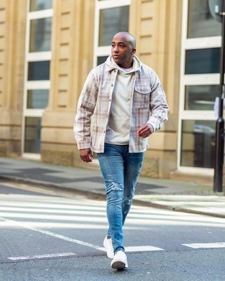 White Plaid Long Sleeve Shirt Outfits For Men: A white plaid long sleeve shirt and blue ripped skinny jeans are essential in any man's well-edited casual wardrobe. You can take a classic approach with footwear and introduce a pair of white canvas low top sneakers to the equation.