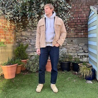 Beige Corduroy Long Sleeve Shirt Outfits For Men: For an on-trend outfit without the need to sacrifice on comfort, we like this combination of a beige corduroy long sleeve shirt and navy jeans. If you're puzzled as to how to round off, complete this outfit with beige suede desert boots.