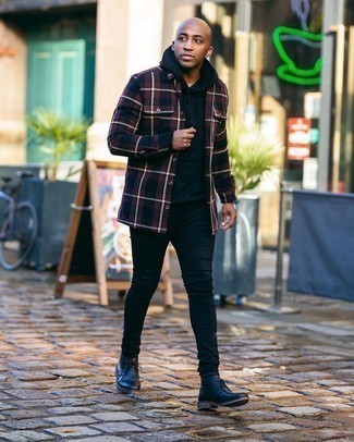 Brown Plaid Long Sleeve Shirt Outfits For Men: If the setting allows a casual look, you can easily wear a brown plaid long sleeve shirt and black skinny jeans. Bring a different twist to an otherwise mostly dressed-down outfit by wearing black leather desert boots.