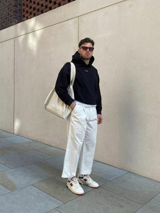 Beige Canvas Tote Bag Outfits For Men: To create a laid-back getup with an urban twist, reach for a navy hoodie and a beige canvas tote bag. Not sure how to finish off your look? Wear white and red leather low top sneakers to smarten it up.