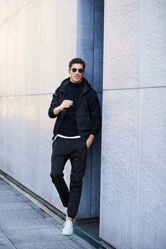 Blue Sunglasses Outfits For Men: This combination of a black hoodie and blue sunglasses is indisputable proof that a simple off-duty ensemble doesn't have to be boring. Want to go all out when it comes to shoes? Introduce a pair of white canvas low top sneakers to your ensemble.