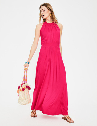 Beige Straw Hat Outfits For Women: This combination of a hot pink maxi dress and a beige straw hat is hard proof that a straightforward casual look doesn't have to be boring. A pair of brown leather thong sandals looks stunning here.