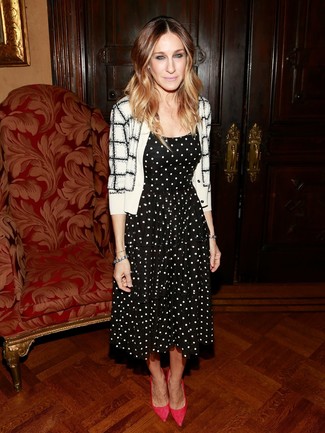 Sarah Jessica Parker wearing Hot Pink Suede Pumps, Black and White Polka Dot Fit and Flare Dress, White and Black Check Cardigan