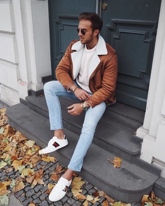 Men's White Print Leather Low Top Sneakers, Light Blue Jeans, White Cable Sweater, Tobacco Shearling Jacket