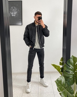 Men's White Leather Low Top Sneakers, Charcoal Jeans, Grey Crew-neck Sweater, Black Bomber Jacket