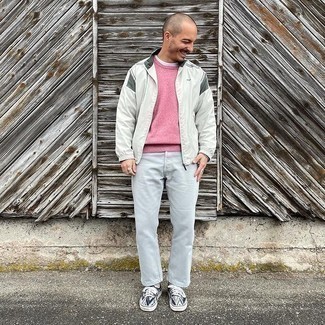 Men's Navy Print Canvas Low Top Sneakers, Grey Jeans, Pink Crew-neck Sweater, Grey Windbreaker