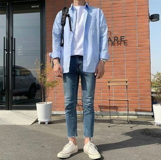 Men's White Canvas Low Top Sneakers, Blue Ripped Jeans, White Crew-neck T-shirt, Light Blue Long Sleeve Shirt