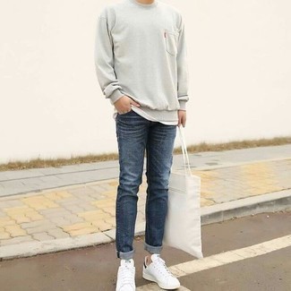 Men's White Leather Low Top Sneakers, Navy Jeans, White Crew-neck T-shirt, Grey Sweatshirt