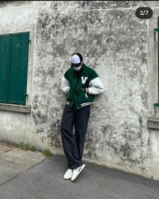 Men's White and Green Canvas Low Top Sneakers, Black Jeans, Black Crew-neck T-shirt, Dark Green Varsity Jacket