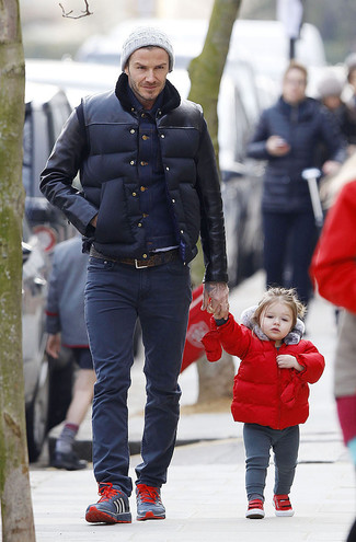 David Beckham wearing Navy Athletic Shoes, Navy Jeans, Navy Denim Jacket, Navy Quilted Gilet