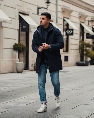 Men's White and Black Leather Low Top Sneakers, Blue Jeans, Navy Long Sleeve Shirt, Navy Parka