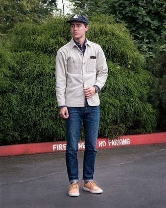 Men's Tan Leather Low Top Sneakers, Navy Jeans, Navy and White Print Long Sleeve Shirt, Grey Shirt Jacket