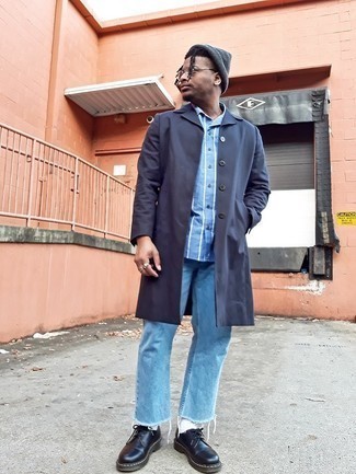 Men's Black Chunky Leather Derby Shoes, Light Blue Jeans, Light Blue Vertical Striped Short Sleeve Shirt, Charcoal Raincoat