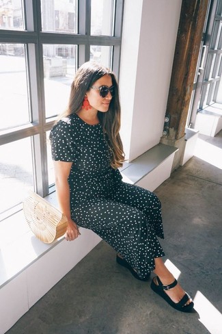 500+ Relaxed Outfits For Women: For an outfit that offers function and fashion, consider wearing a black and white polka dot jumpsuit. For something more on the daring side to finish this look, introduce a pair of black leather flat sandals to the mix.
