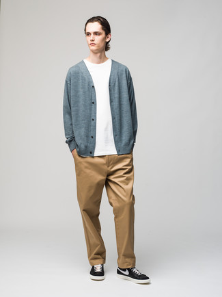Men's Black and White Leather Low Top Sneakers, Khaki Chinos, White Crew-neck T-shirt, Light Blue Cardigan