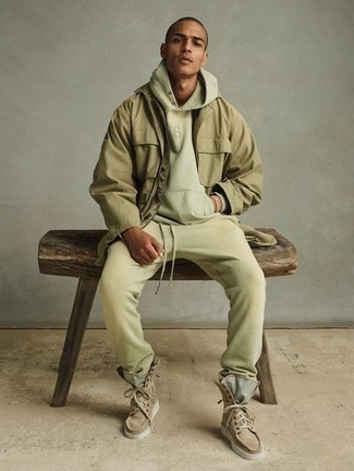 Khaki Field Jacket Outfits: A khaki field jacket and a beige track suit are the perfect foundation for a cool and casual outfit. Demonstrate your elegant side by finishing off with a pair of tan suede casual boots.