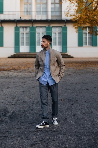 Khaki Field Jacket Outfits: If you like practical style, opt for a khaki field jacket and charcoal chinos. Got bored with this outfit? Enter black and white canvas low top sneakers to jazz things up.
