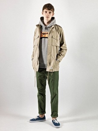 Khaki Military Jacket Outfits For Men: Such pieces as a khaki military jacket and olive chinos are an easy way to introduce effortless cool into your day-to-day casual arsenal. A pair of navy and white canvas low top sneakers will instantly play down an all-too-dressy outfit.