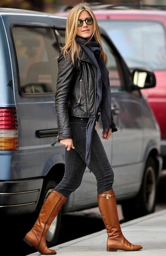 Jennifer Aniston wearing Charcoal Scarf, Tobacco Leather Knee High Boots, Charcoal Skinny Jeans, Black Leather Biker Jacket