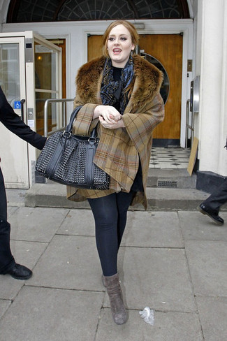 Adele wearing Grey Suede Ankle Boots, Black Leggings, Black Turtleneck, Tan Plaid Poncho