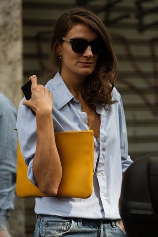 Want to infuse your wardrobe with some laid-back cool? Try teaming a light blue button down blouse with blue jeans.