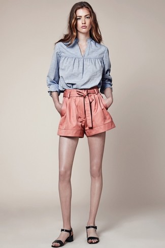 Light Blue Chambray Long Sleeve Blouse Outfits: This outfit with a light blue chambray long sleeve blouse and pink shorts isn't super hard to put together and easy to change throughout the day. Black leather heeled sandals are a great choice to complete this ensemble.