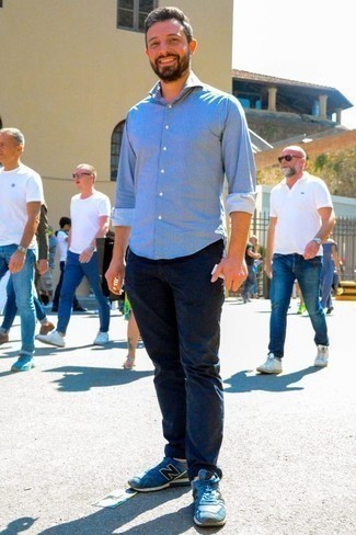 Navy Athletic Shoes Outfits For Men: This laid-back combination of a light blue chambray long sleeve shirt and navy chinos is very easy to pull together in no time, helping you look seriously stylish and prepared for anything without spending a ton of time combing through your wardrobe. For something more on the casual and cool side to finish your outfit, introduce navy athletic shoes to the mix.