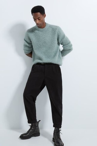 Light Blue Crew-neck Sweater Outfits For Men: Combining a light blue crew-neck sweater with black chinos is a savvy choice for a laid-back but seriously stylish look. Hesitant about how to complement your getup? Round off with a pair of black leather casual boots to ramp up the wow factor.