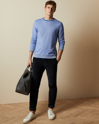 Black Leather Holdall Outfits For Men: For something on the casual and cool end, you can always rely on a light blue crew-neck sweater and a black leather holdall. Perk up your look by finishing with white leather low top sneakers.