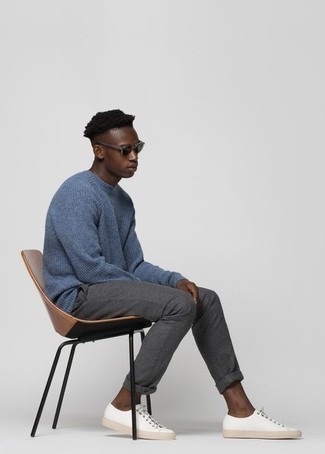 Men's Light Blue Crew-neck Sweater, Grey Chinos, White Canvas Low Top Sneakers, Dark Green Sunglasses