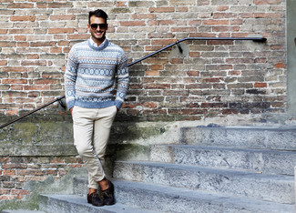 Light Blue Crew-neck Sweater Outfits For Men: This off-duty combo of a light blue crew-neck sweater and khaki chinos is a goofproof option when you need to look great in a flash. To add some extra fanciness to this look, add a pair of tan woven derby shoes to this look.
