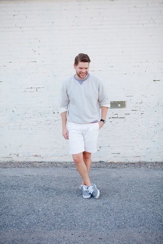 Light Blue Crew-neck Sweater Outfits For Men: A light blue crew-neck sweater and white shorts are the ideal way to introduce effortless cool into your casual repertoire. The whole ensemble comes together if you complete this outfit with a pair of light blue canvas low top sneakers.
