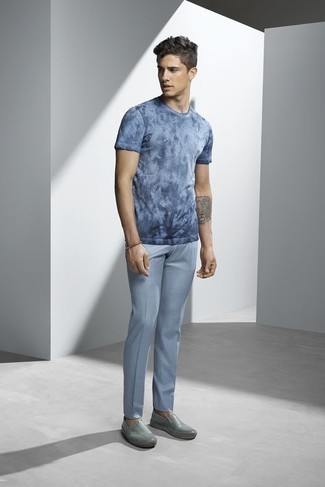 Grey Leather Slip-on Sneakers Outfits For Men: Consider teaming a light blue tie-dye crew-neck t-shirt with light blue dress pants if you're going for a sleek, on-trend outfit. Inject a fun vibe into your look by finishing with grey leather slip-on sneakers.