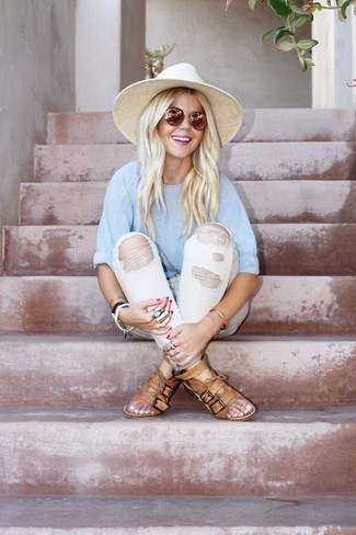 Light Blue Crew-neck T-shirt Outfits For Women: Marrying a light blue crew-neck t-shirt and white ripped jeans will hallmark your styling savvy even on weekend days. Tan leather flat sandals act as the glue that will bring this ensemble together.