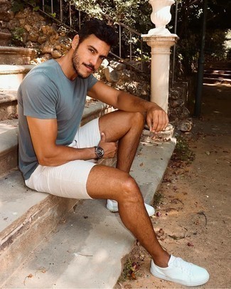 White Shorts Outfits For Men: You'll be amazed at how extremely easy it is for any man to throw together this casual look. Just a light blue crew-neck t-shirt and white shorts. A good pair of white leather low top sneakers pulls this ensemble together.