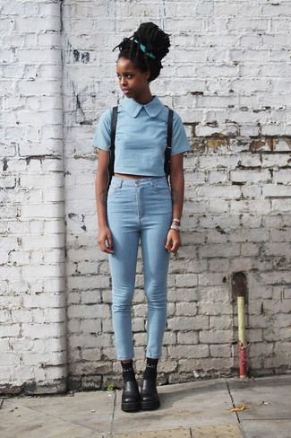 Women's Light Blue Cropped Top, Light Blue Skinny Jeans, Black Leather Chelsea Boots, Black Leather Backpack