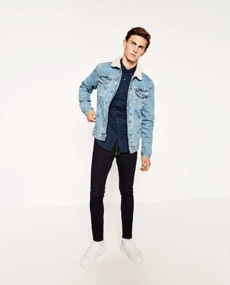Navy and White Polka Dot Long Sleeve Shirt Outfits For Men: A navy and white polka dot long sleeve shirt and black skinny jeans have become true menswear elements. For something more on the smart side to finish off this look, complement this look with a pair of white leather low top sneakers.